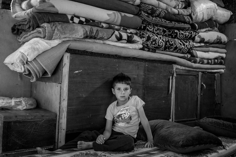  تصوير الكساندر افونسو - نازحون ايزديون لا يملكون شيئا لكنهم يهبون كل شيء 